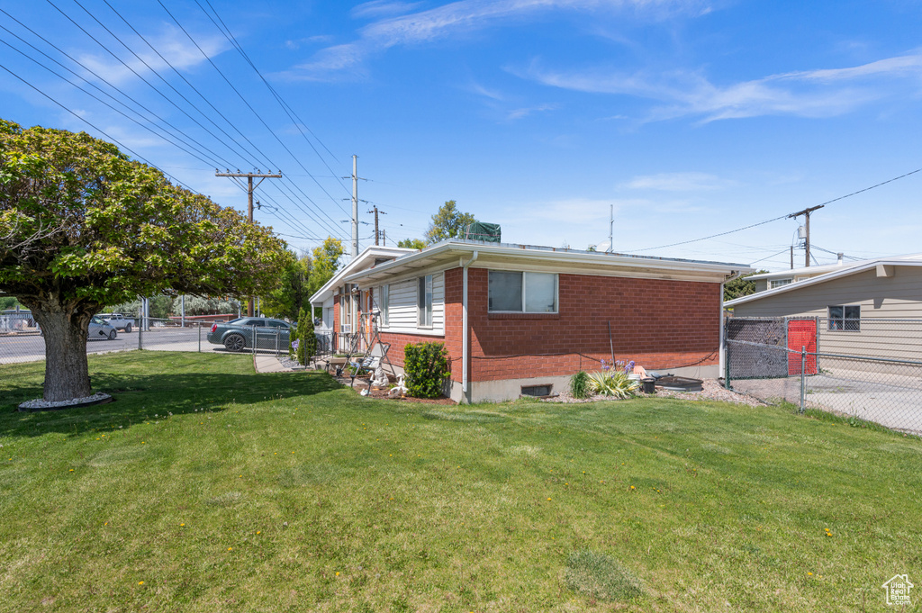 View of front of house featuring brick siding
