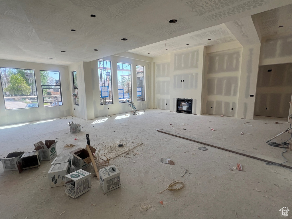 Unfurnished living room with a wealth of natural light
