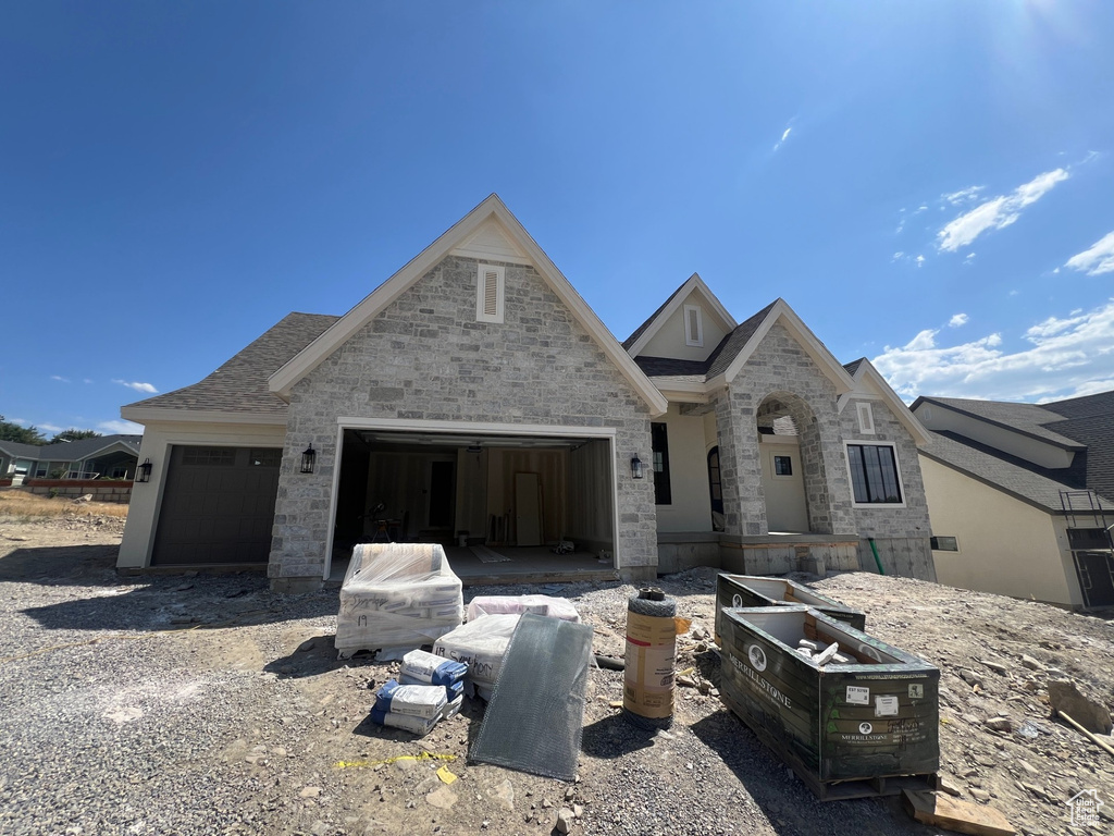 View of front of home with a garage