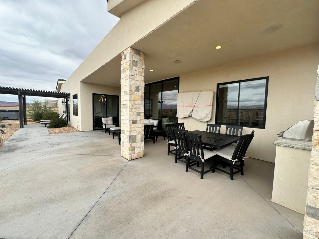 View of patio / terrace featuring outdoor dining area and an outdoor hangout area