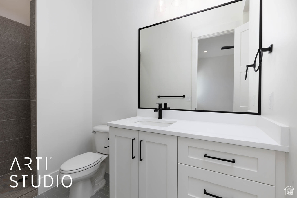 Bathroom with vanity and toilet