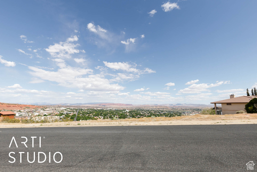 View of asphalt road featuring a mountain view