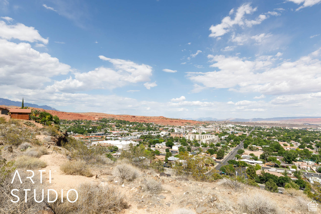 View of mountain backdrop with nearby suburban area