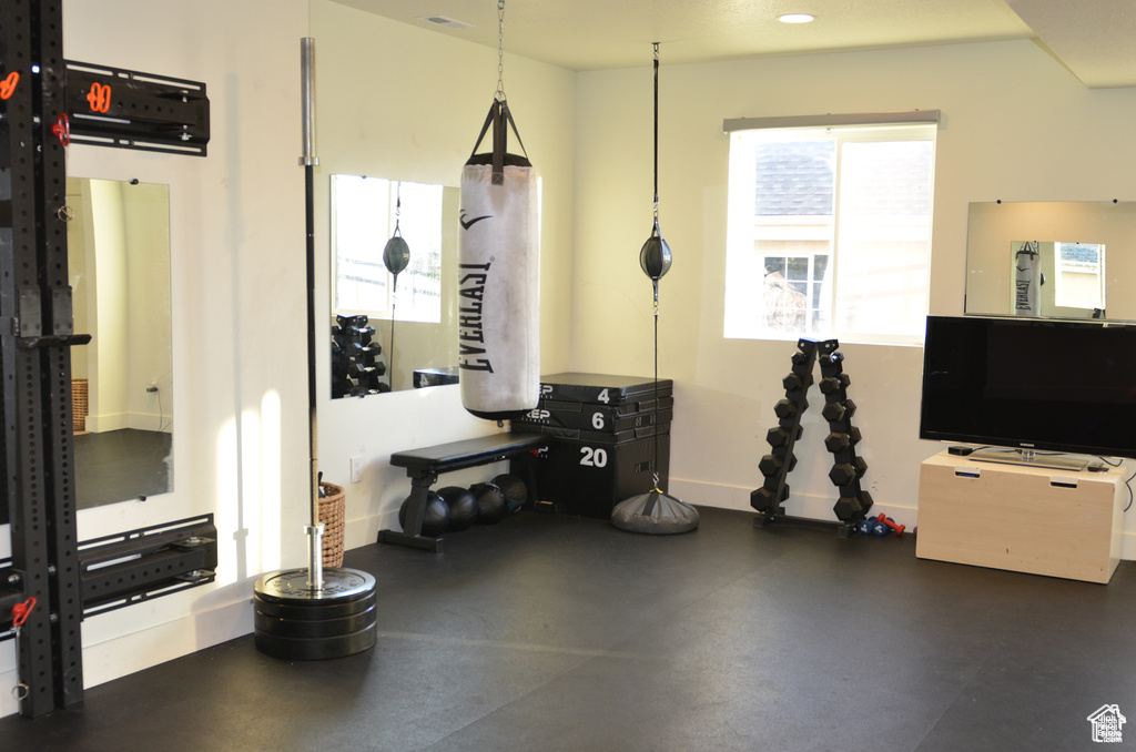 Garage featuring baseboards