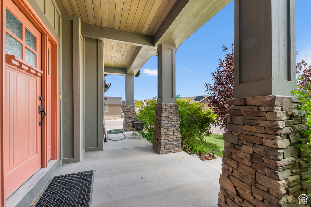 View of patio featuring covered porch