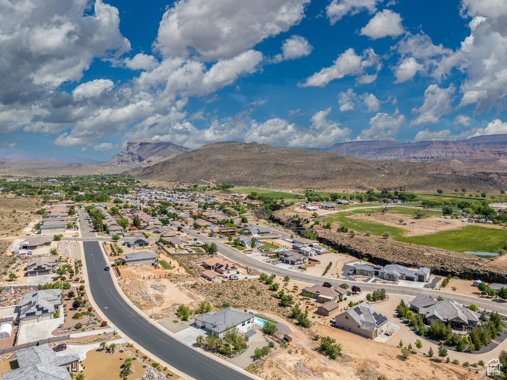 Aerial view of residential area with a mountainous background