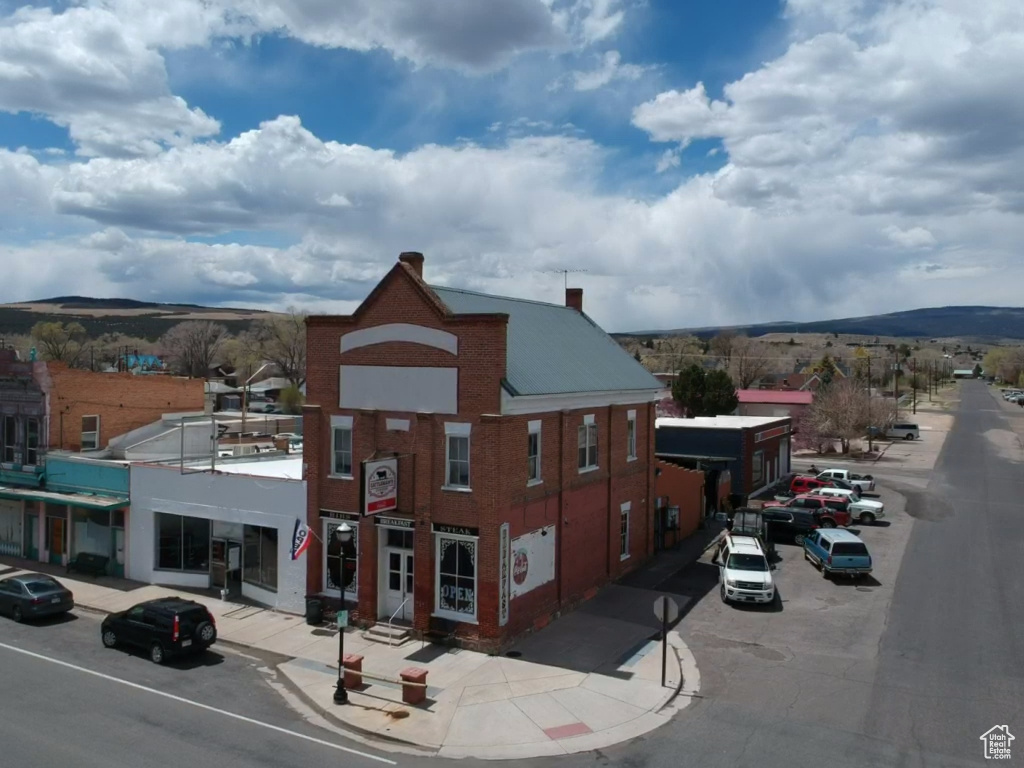 View of property with a mountain view