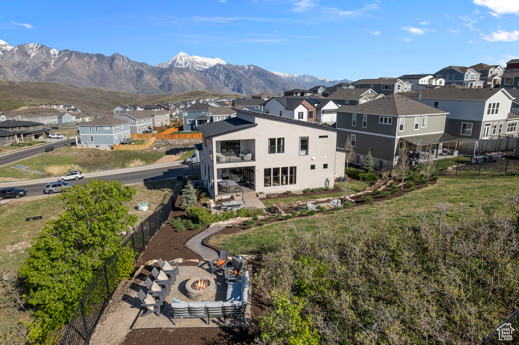 Aerial view of residential area featuring mountains