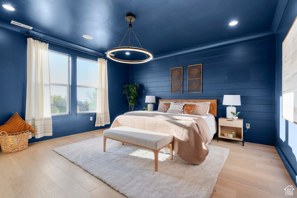 Bedroom featuring wood finished floors and recessed lighting