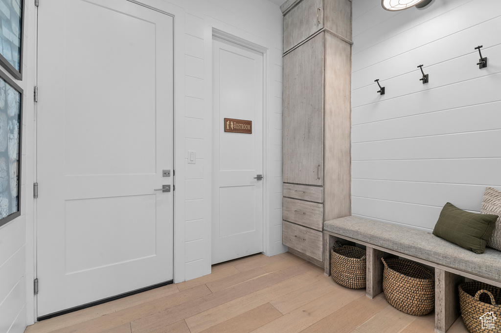 Mudroom featuring light wood finished floors