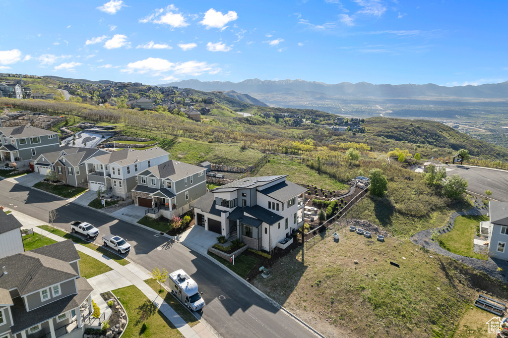 Aerial view of residential area with mountains