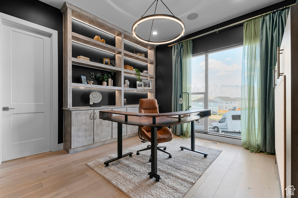 Office area featuring light wood-type flooring