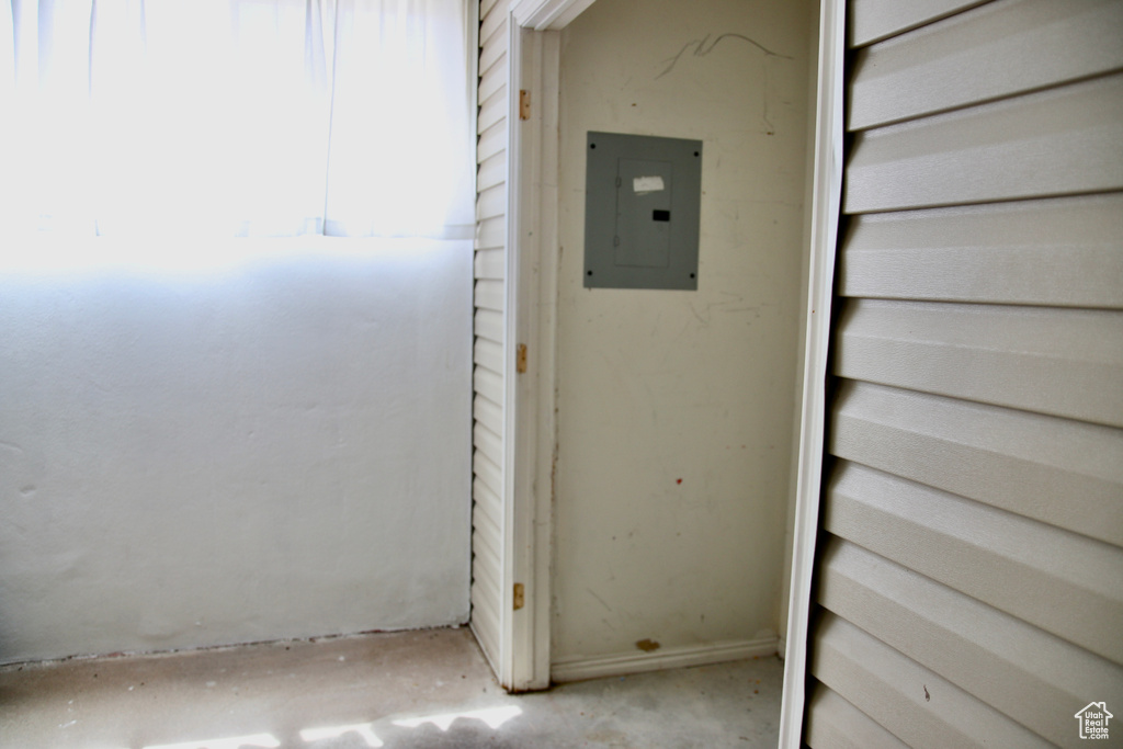 Detailed view of electric panel and unfinished concrete floors
