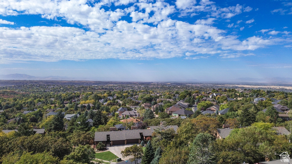 Aerial view of residential area with a mountainous background