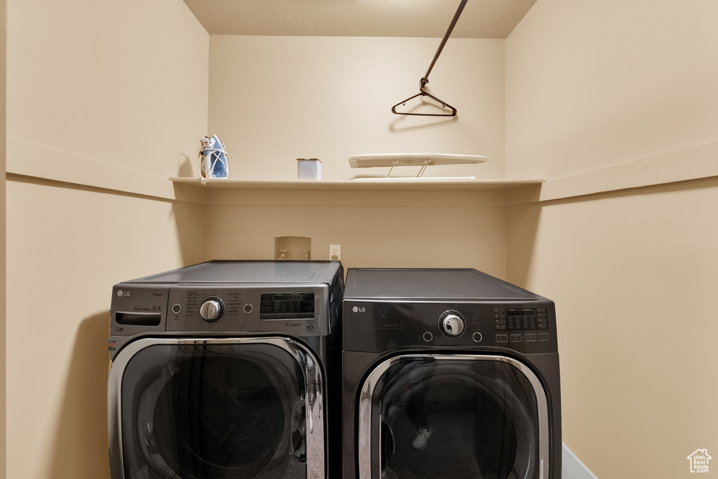 Laundry area featuring independent washer and dryer