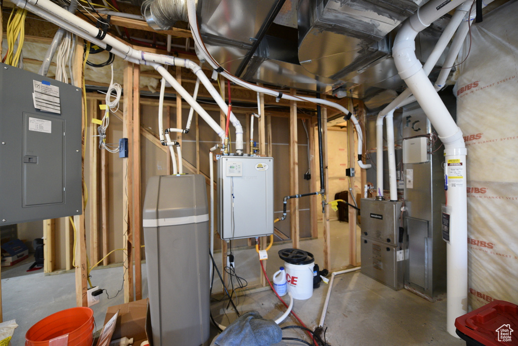 Utilities featuring electric panel and water heater