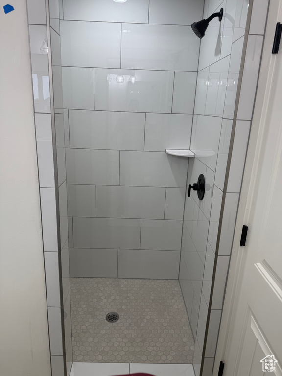 Full bath with a shower stall