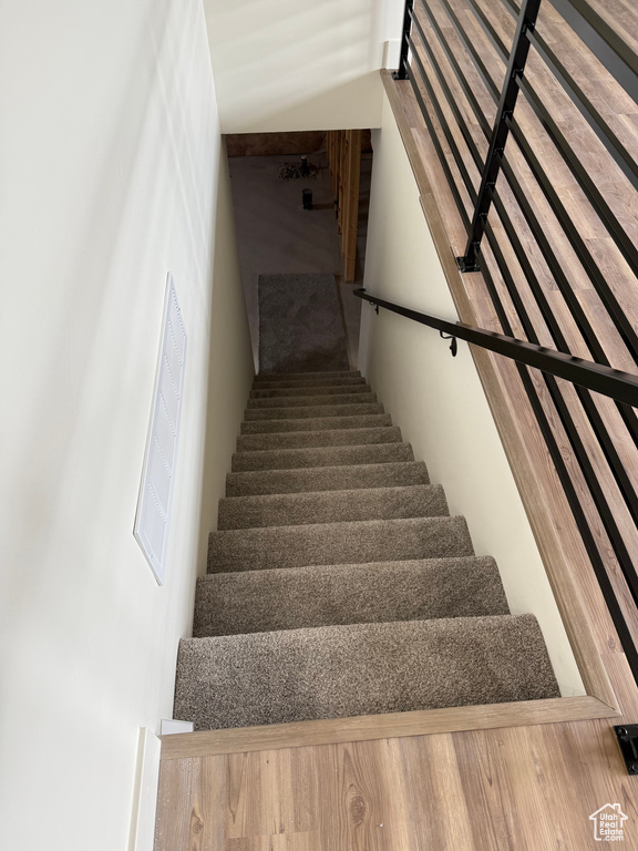 Stairs with wood finished floors