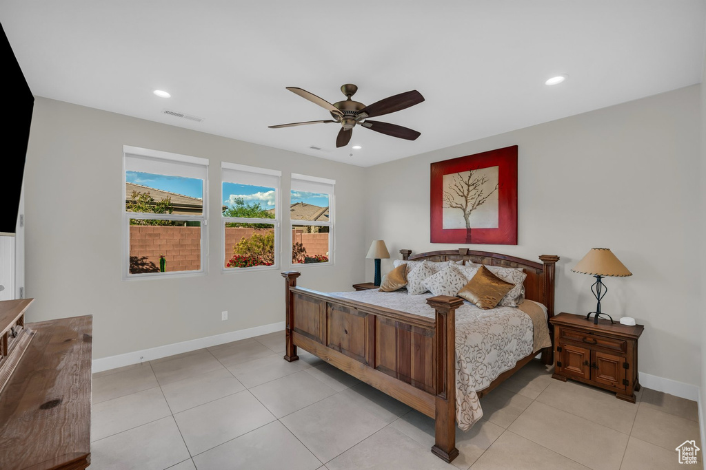 Bedroom with baseboards, recessed lighting, ceiling fan, and light tile patterned flooring