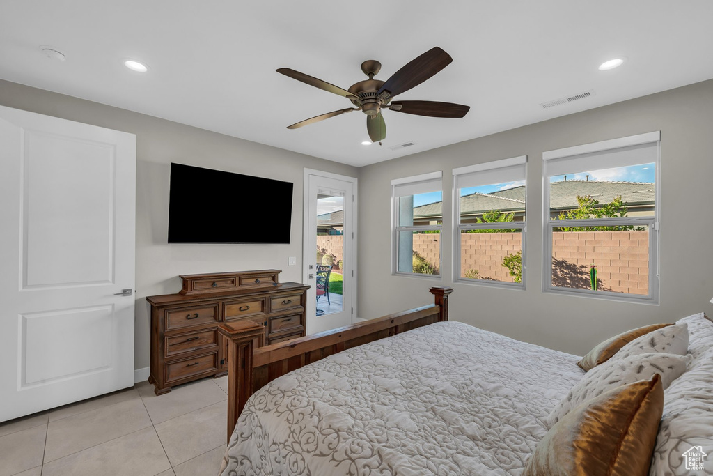Bedroom featuring access to exterior, light tile patterned flooring, recessed lighting, ceiling fan, and baseboards