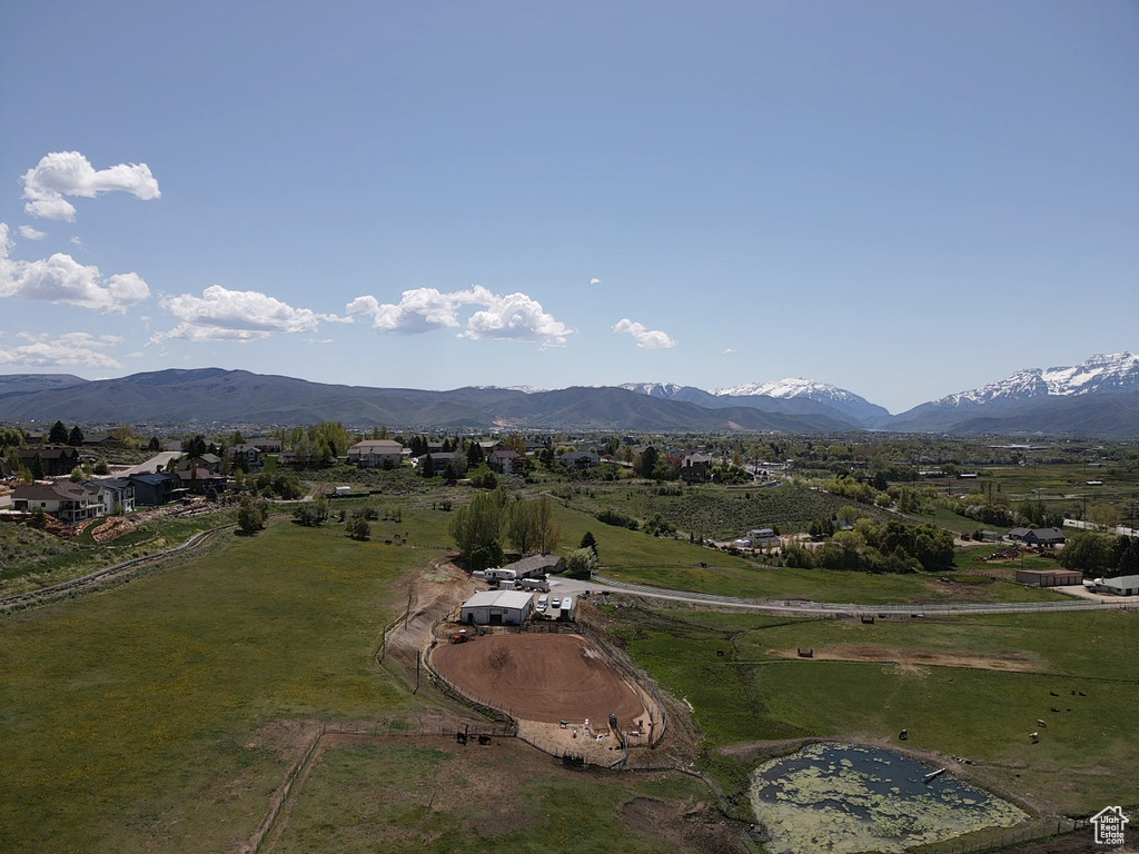 Aerial overview of property's location with a mountain backdrop