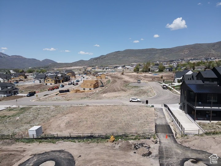 View of mountain backdrop with nearby suburban area