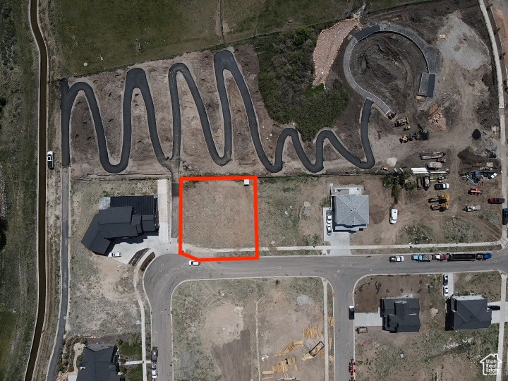 Aerial overview of property's location with property parcel outlined