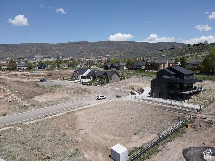 Aerial view of residential area with a mountain backdrop