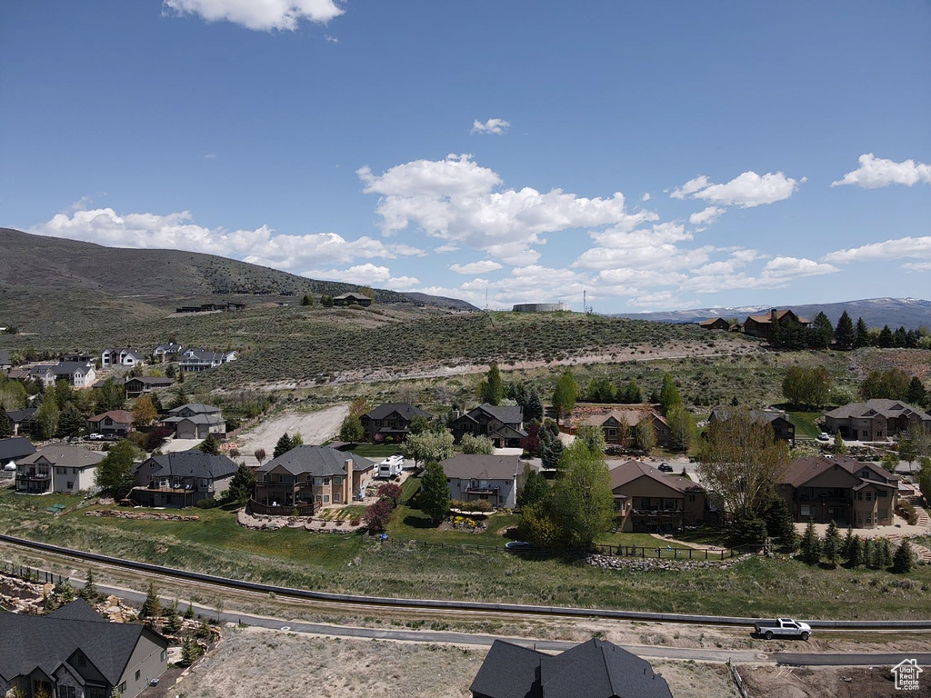 View of mountain background featuring nearby suburban area