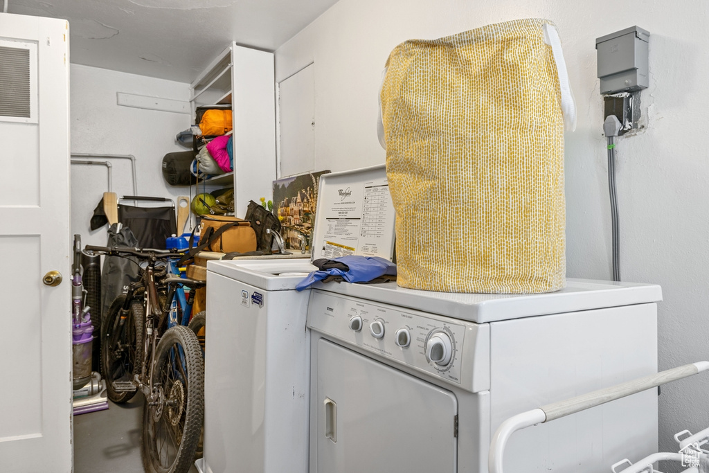 Laundry area featuring separate washer and dryer