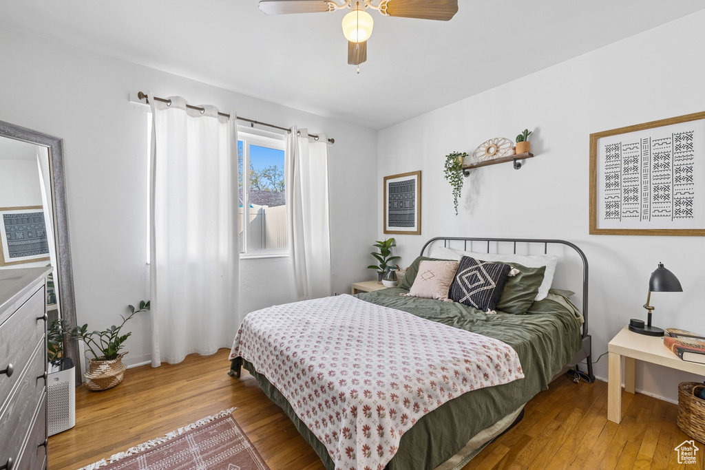 Bedroom featuring light wood-style floors and ceiling fan