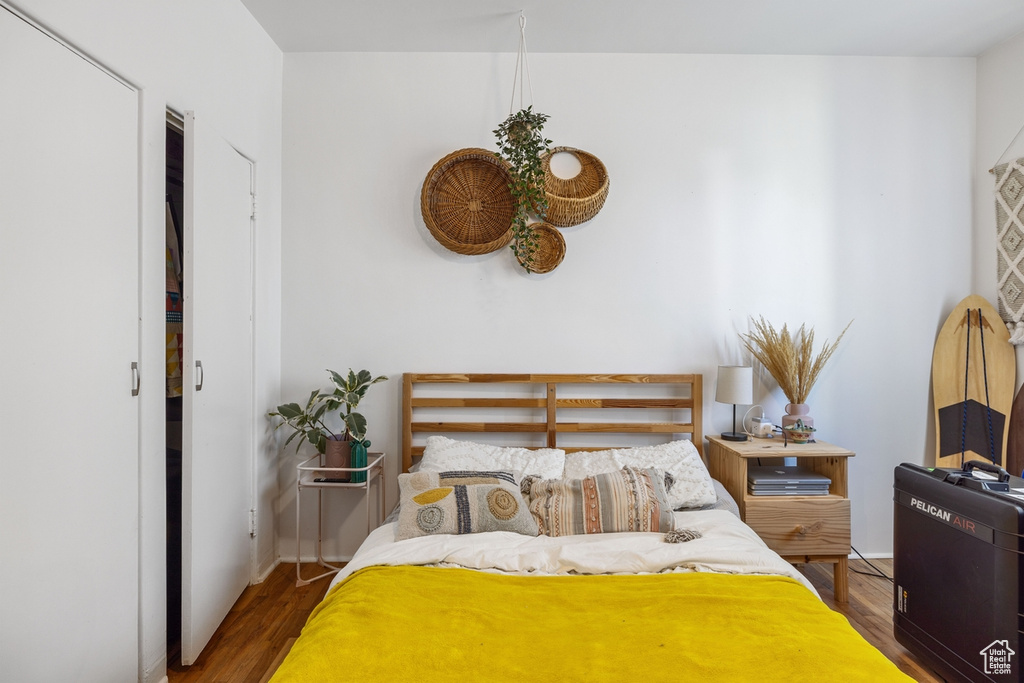 Bedroom with wood finished floors