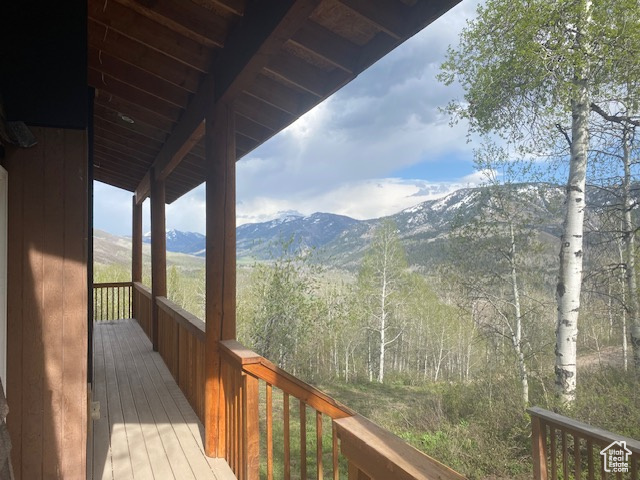 Wooden terrace with a mountain view