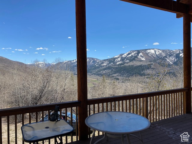 Deck featuring a mountain view