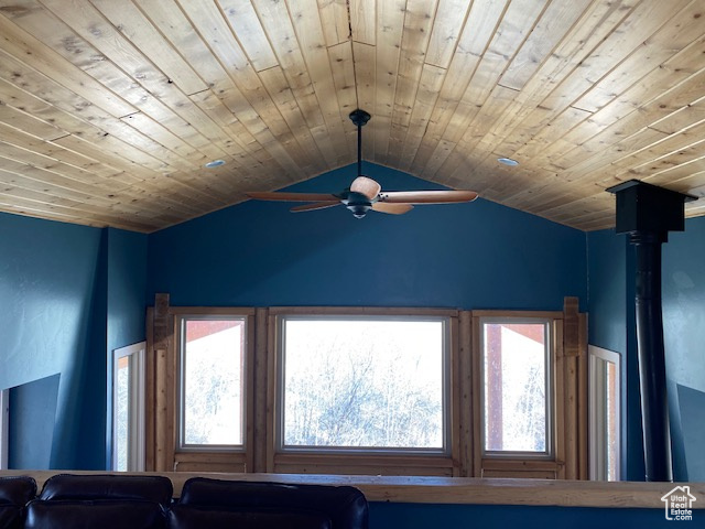 Detailed view of a ceiling fan and wooden ceiling