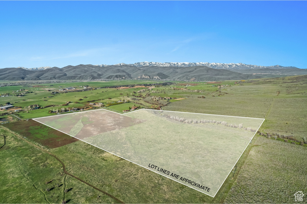 View of rural area featuring mountains and property boundaries highlighted