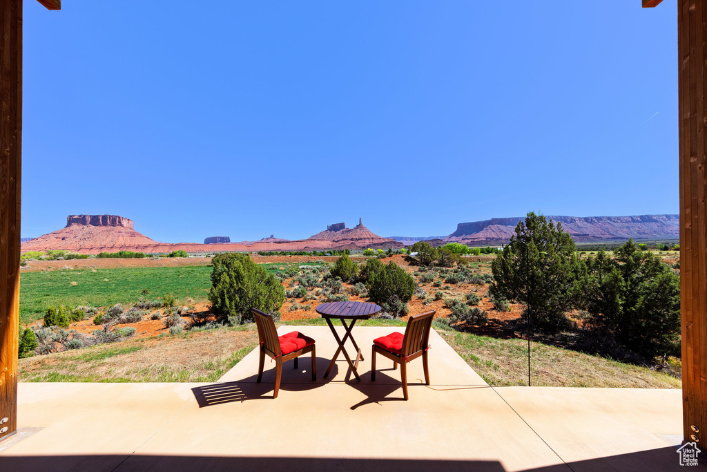 View of patio / terrace with a mountain view