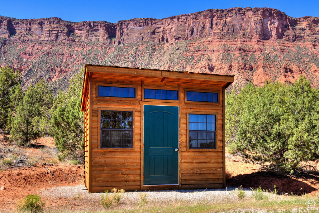 View of outdoor structure featuring an outbuilding and a mountain view