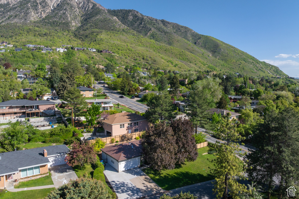 Aerial view of residential area with a mountainous background