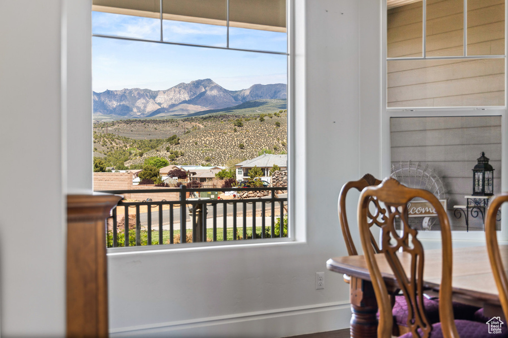 Dining area featuring a mountain view and plenty of natural light