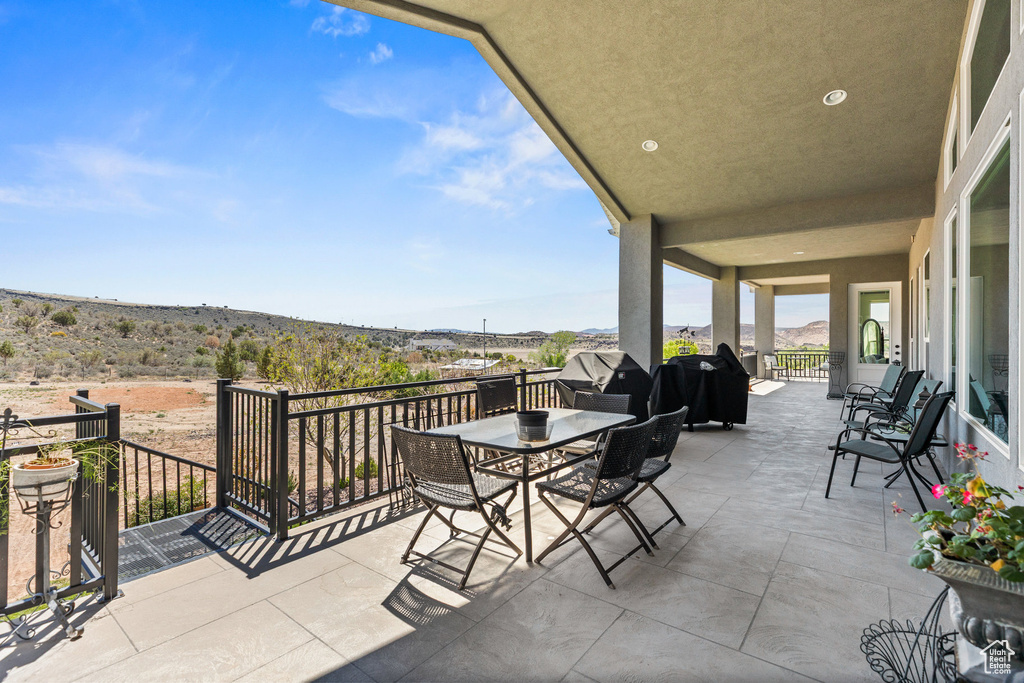 View of patio with outdoor dining space