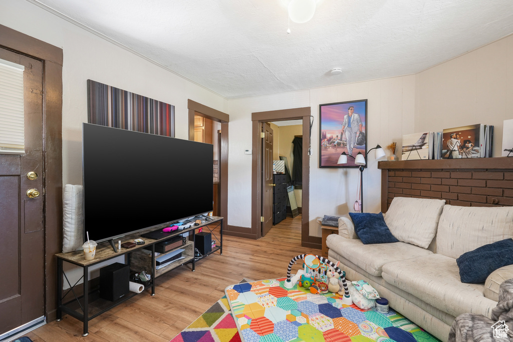 Living area featuring wood finished floors