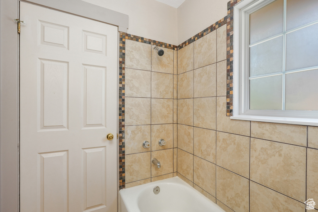 Bathroom with shower / tub combination
