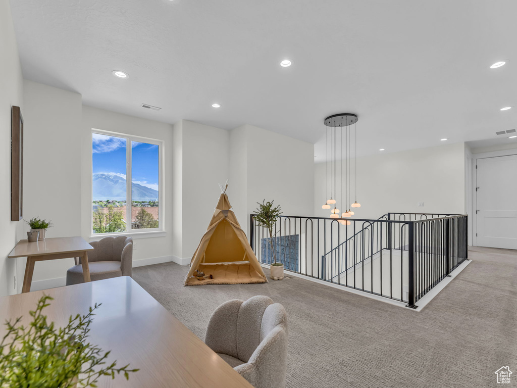 Playroom featuring carpet flooring, a chandelier, recessed lighting, and baseboards
