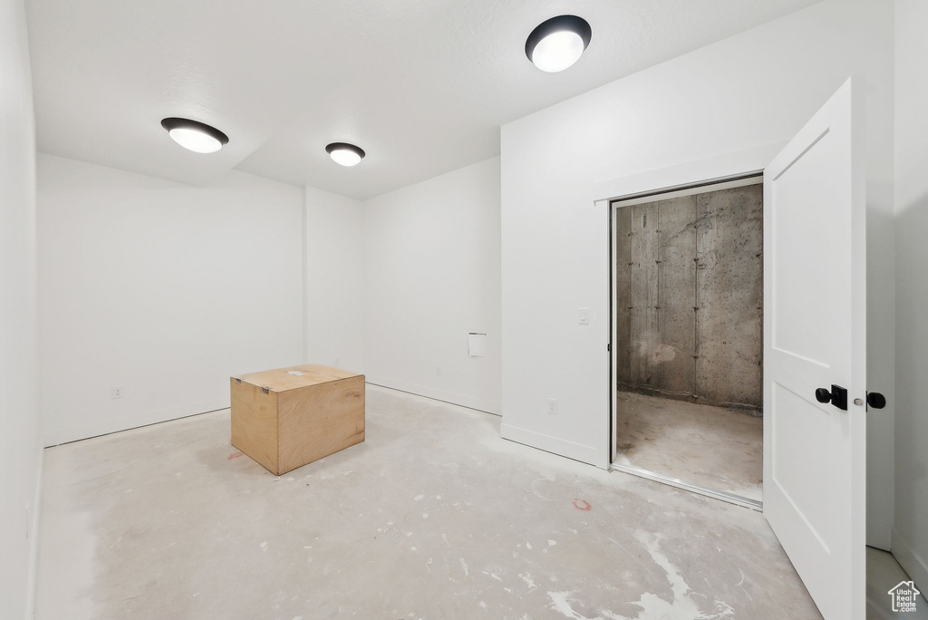 Interior space with unfinished concrete floors