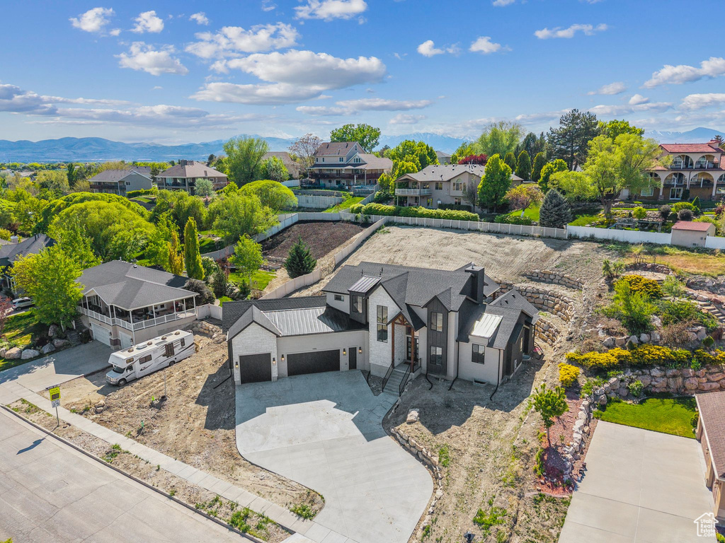Aerial view of residential area with a mountain backdrop