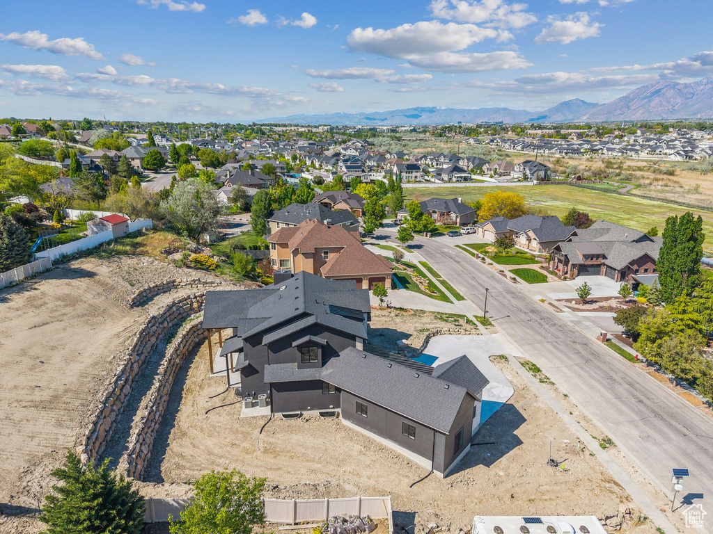 Aerial view of residential area with mountains