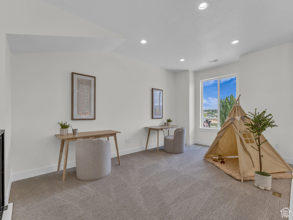 Recreation room featuring carpet flooring, recessed lighting, baseboards, and lofted ceiling