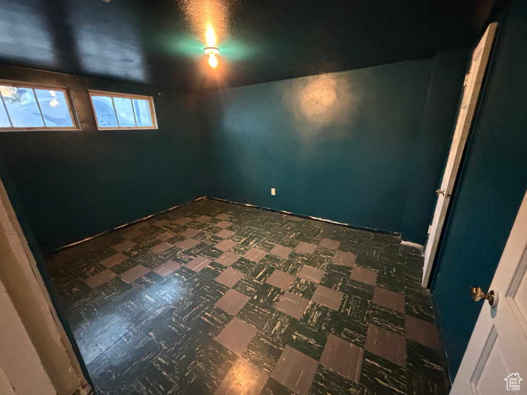 Empty room with tile patterned floors