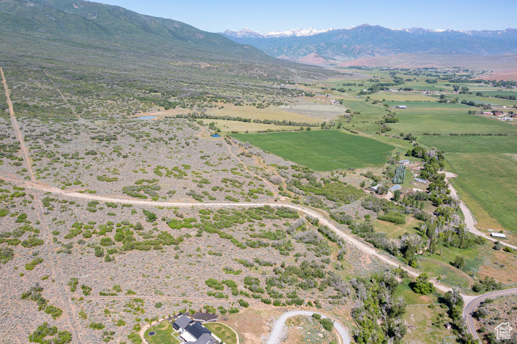 View of property location with rural landscape and mountains